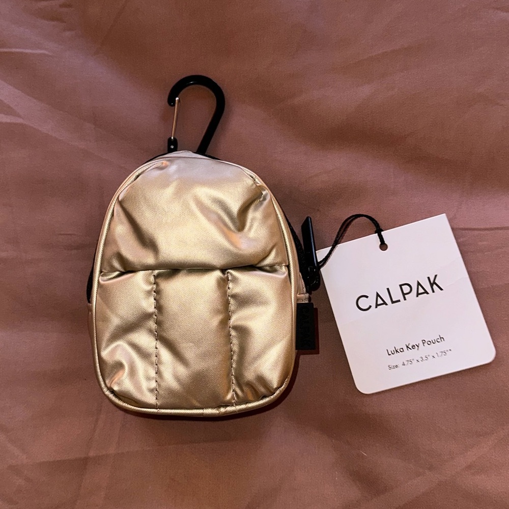 Calpak Luka Backpack Key Pouch in gold -BNWT